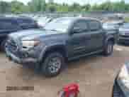 2018 Toyota Tacoma SR5 with VIN 5TFAZ5CN2JX061728, listed as a IAAI auction lot 42775812 with 119,408 mi miles and . Bid and sale history available at DreamBid. Image 2.