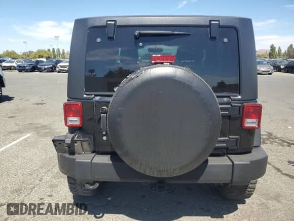 2013 Jeep Wrangler Sport с VIN 1C4AJWAG0DL558015, выставлен на аукционе Copart как лот 69876955 с пробегом 122 776 миль миль и Списание • Salvage title. История ставок и продаж доступна на DreamBid. Изображение 6.