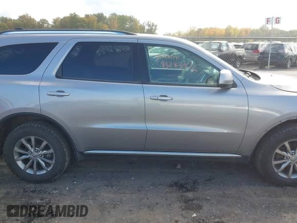 2018 Dodge Durango SXT with VIN 1C4RDJAG5JC176264, listed as a IAAI auction lot 43283972 with 141,830 mi miles and . Bid and sale history available at DreamBid. Image 13.
