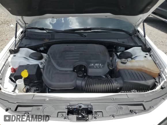 2021 Chrysler 300 S z VIN 2C3CCABGXMH660590, wystawiony jako Copart lot #67189925 z przebiegiem 66 939 mil mil oraz Szkoda całkowita • Salvage title. Historia ofert i sprzedaży dostępna na DreamBid. Obrazek 11.