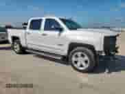 2017 Chevrolet Silverado 1500 LTZ with VIN 3GCPCSECXHG145834, listed as a Copart auction lot 65348985 with 153,460 mi miles and Salvage title. Bid and sale history available at DreamBid. Image 4.