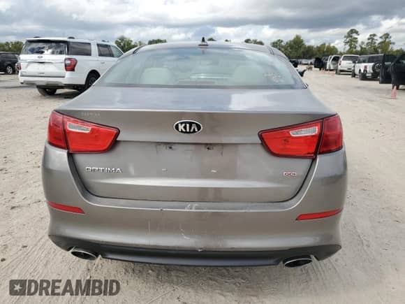 2015 Kia Optima LX с VIN 5XXGM4A76FG510205, выставлен на аукционе Copart как лот 82489145 с пробегом 140 458 миль миль и Чистый • Clean title. История ставок и продаж доступна на DreamBid. Изображение 6.