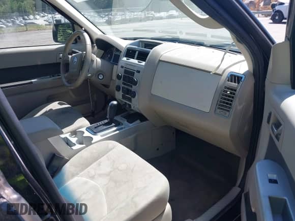 2009 Mercury Mariner Hybrid with VIN 4M2CU29359KJ17577, listed as a IAAI auction lot 43091811 with 247,830 mi miles and . Bid and sale history available at DreamBid. Image 5.