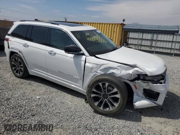2023 Jeep Grand Cherokee Overland with VIN 1C4RJHDG9PC517056, listed as a Copart auction lot 54929955 with 18,418 mi miles and Salvage title. Bid and sale history available at DreamBid. Image 4.