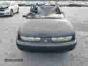 1999 Saturn SL with VIN 1G8ZJ5276XZ106206, listed as a Copart auction lot 75212184 with Not provided miles and Salvage title. Bid and sale history available at DreamBid. Image 5.
