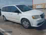 2014 Dodge Grand Caravan SE with VIN 2C4RDGBG1ER114603, listed as a IAAI auction lot 43201305 with 206,724 mi miles and . Bid and sale history available at DreamBid. Image 1.
