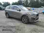 2016 Kia Sorento SXL с VIN 5XYPKDA18GG141684, выставлен на аукционе Copart как лот 69874325 с пробегом 137 160 миль миль и Списание • Salvage title. История ставок и продаж доступна на DreamBid. Изображение 4.