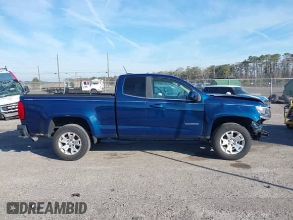 2020 Chevrolet Colorado 2WD LT z VIN 1GCHSCEA7L1109912, wystawiony jako IAAI lot #41338497 z przebiegiem 82 131 mil mil oraz . Historia ofert i sprzedaży dostępna na DreamBid. Obrazek 13.