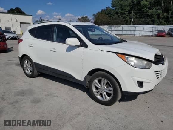2011 Hyundai Tucson GLS z VIN KM8JU3AC1BU261485, wystawiony jako Copart lot #81221455 z przebiegiem 85 241 mil mil oraz Szkoda całkowita • Salvage title. Historia ofert i sprzedaży dostępna na DreamBid. Obrazek 4.