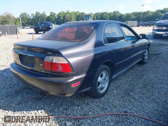 1996 Honda Accord LX with VIN 1HGCD5638TA212631, listed as a IAAI auction lot 42885419 with 258,242 mi miles and . Bid and sale history available at DreamBid. Image 4.