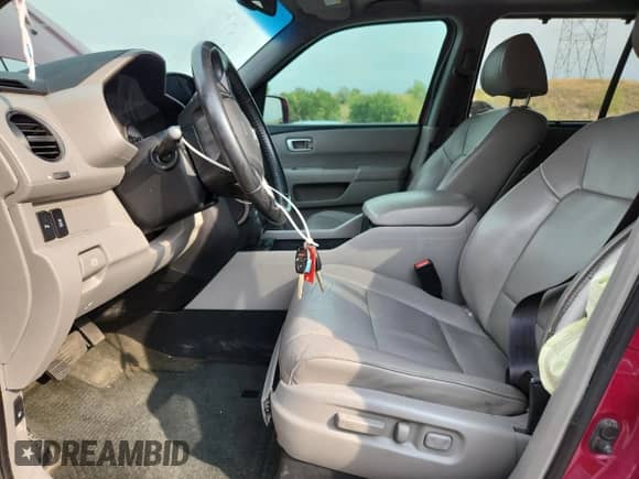 2015 Honda Pilot Touring z VIN 5FNYF4H94FB044184, wystawiony jako Copart lot #70935795 z przebiegiem 115 807 mil mil oraz Szkoda całkowita • Salvage title. Historia ofert i sprzedaży dostępna na DreamBid. Obrazek 7.