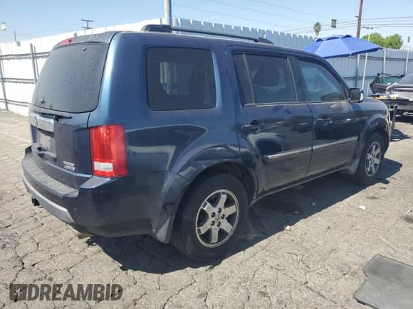 2009 Honda Pilot Touring with VIN 5FNYF488X9B041284, listed as a Copart auction lot 64602555 with 273,147 mi miles and Salvage title. Bid and sale history available at DreamBid. Image 3.