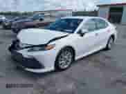 2021 Toyota Camry LE with VIN 4T1C11AK8MU601313, listed as a IAAI auction lot 43383218 with 34,384 mi miles and . Bid and sale history available at DreamBid. Image 17.