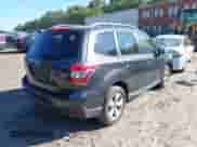 2014 Subaru Forester Premium with VIN JF2SJAEC6EH507879, listed as a IAAI auction lot 43116725 with 143,610 mi miles and . Bid and sale history available at DreamBid. Image 4.