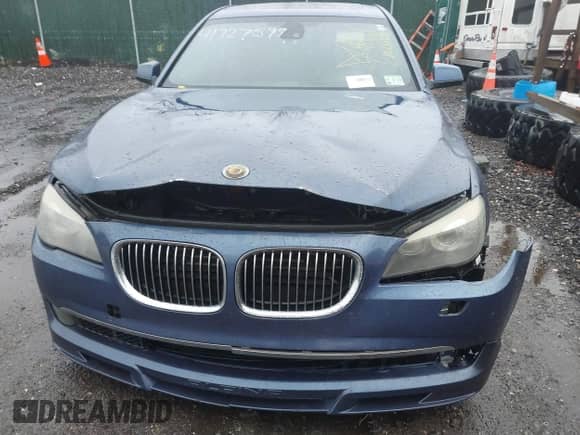 2012 BMW 7 Series 750i z VIN WBAKA8C52CC447019, wystawiony jako IAAI lot #41727599 z przebiegiem Nie podano mil oraz . Historia ofert i sprzedaży dostępna na DreamBid. Obrazek 6.