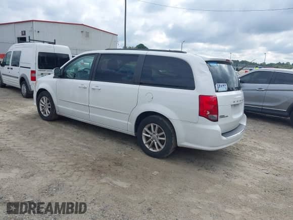 2014 Dodge Grand Caravan SXT with VIN 2C4RDGCG0ER152726, listed as a IAAI auction lot 43232494 with 162,088 mi miles and . Bid and sale history available at DreamBid. Image 3.