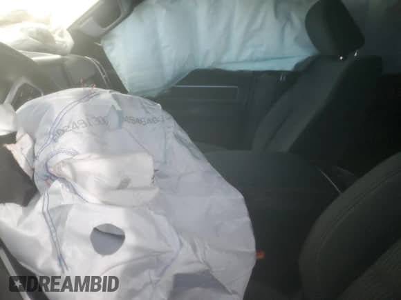 2023 Ram 1500 Lone Star with VIN 1C6SRFFT1PN682023, listed as a Copart auction lot 42012665 with Not provided miles and Salvage title. Bid and sale history available at DreamBid. Image 7.