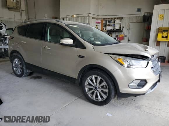 2017 Ford Escape Titanium с VIN 1FMCU0JD8HUE35755, выставлен на аукционе Copart как лот 68698985 с пробегом 111 087 миль миль и Списание • Salvage title. История ставок и продаж доступна на DreamBid. Изображение 4.