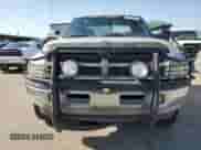 2000 Dodge 1500 z VIN 3B7HF13Z7YM207771, wystawiony jako Copart lot #59295485 z przebiegiem 164 220 mil mil oraz Szkoda całkowita • Salvage title. Historia ofert i sprzedaży dostępna na DreamBid. Obrazek 5.