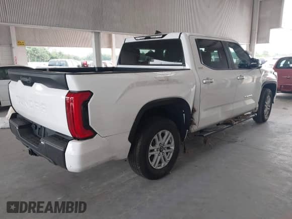 2025 Toyota Tundra SR with VIN 5TFLA5AB3SX043183, listed as a IAAI auction lot 43239112 with 18,540 mi miles and . Bid and sale history available at DreamBid. Image 4.