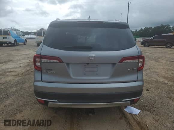 2022 Honda Pilot Touring 7-Passenger with VIN 5FNYF5H63NB027936, listed as a Copart auction lot 68381775 with 62,313 mi miles and Salvage title. Bid and sale history available at DreamBid. Image 6.