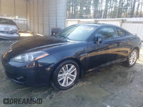 2008 Hyundai Tiburon GS with VIN KMHHM66D08U292138, listed as a Copart auction lot 83320704 with 277,189 mi miles and Salvage title. Bid and sale history available at DreamBid. Image 1.