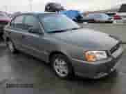 2002 Hyundai Accent GL z VIN KMHCG45C72U269610, wystawiony jako Copart lot #80362953 z przebiegiem 89 481 mil mil oraz Szkoda całkowita • Salvage title. Historia ofert i sprzedaży dostępna na DreamBid. Obrazek 4.