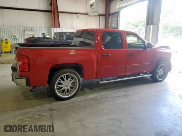 2012 Chevrolet Silverado 1500 LT с VIN 3GCPCSEAXCG105633, выставлен на аукционе Copart как лот 61958575 с пробегом 142 781 миль миль и Списание • Salvage title. История ставок и продаж доступна на DreamBid. Изображение 3.