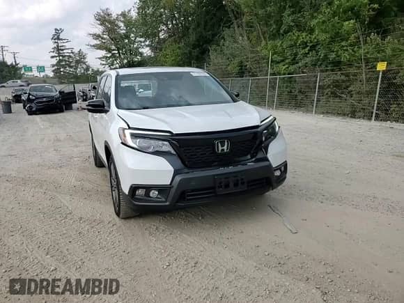 2020 Honda Passport EX-L with VIN 5FNYF8H50LB016902, listed as a Copart auction lot 71705155 with 38,436 mi miles and Salvage title. Bid and sale history available at DreamBid. Image 14.