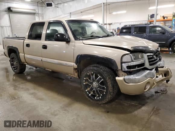 2006 GMC Sierra 1500 SLT with VIN 2GTEK13T861151161, listed as a Copart auction lot 57295185 with 233,274 mi miles and Salvage title. Bid and sale history available at DreamBid. Image 4.
