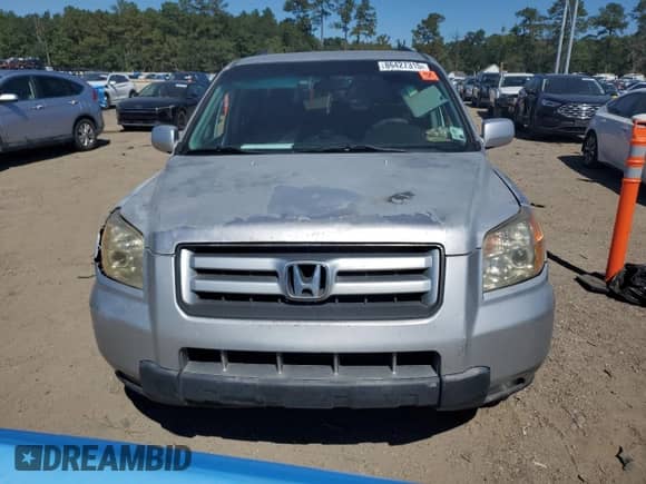2006 Honda Pilot EX z VIN 5FNYF28476B025217, wystawiony jako Copart lot #86427315 z przebiegiem 309 243 mil mil oraz Szkoda całkowita • Salvage title. Historia ofert i sprzedaży dostępna na DreamBid. Obrazek 5.