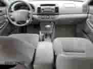 2005 Toyota Camry LE с VIN 4T1BE32K35U073739, выставлен на аукционе Copart как лот 82128585 с пробегом 223 761 миль миль и Списание • Salvage title. История ставок и продаж доступна на DreamBid. Изображение 8.