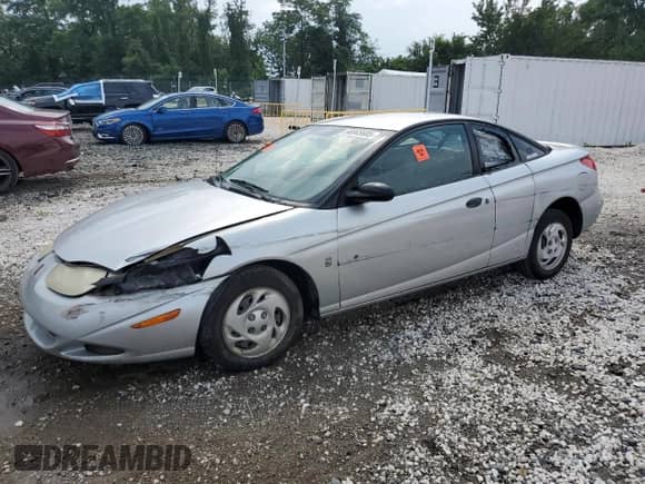 2002 Saturn SC с VIN 1G8ZP12892Z128385, выставлен на аукционе Copart как лот 66945605 с пробегом 134 237 миль миль и Списание • Salvage title. История ставок и продаж доступна на DreamBid. Изображение 1.