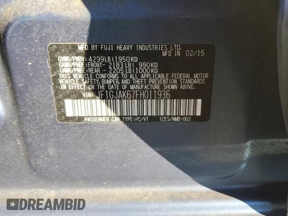 2015 Subaru Impreza Premium with VIN JF1GJAK67FH011936, listed as a Copart auction lot 82347145 with 59,508 mi miles and Salvage title. Bid and sale history available at DreamBid. Image 12.