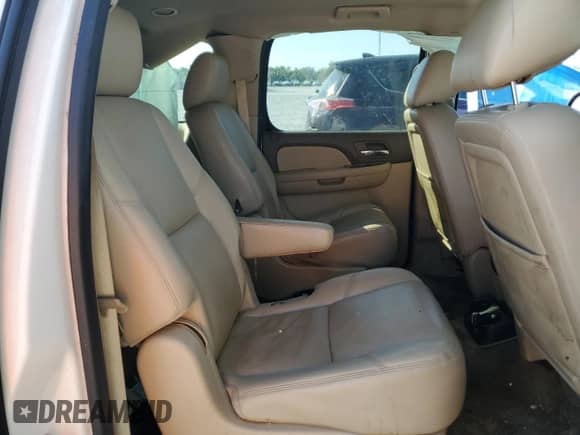 2012 Chevrolet Suburban LTZ with VIN 1GNSKKE79CR284644, listed as a Copart auction lot 70628985 with 203,439 mi miles and Salvage title. Bid and sale history available at DreamBid. Image 11.