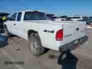 2003 Dodge Dakota с VIN 1D7HG12X43S345125, выставлен на аукционе IAAI как лот 41327861 с пробегом 312 385 миль миль и . История ставок и продаж доступна на DreamBid. Изображение 3.