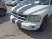 2008 Dodge Dakota SLT with VIN 1D3HE42K38S595704, listed as a IAAI auction lot 43455232 with 317,071 mi miles and . Bid and sale history available at DreamBid. Image 6.