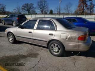 2002 Chevrolet Prizm z VIN 1Y1SK52872Z412932, wystawiony jako Copart lot #81051604 z przebiegiem 126 544 mil mil oraz Szkoda całkowita • Salvage title. Historia ofert i sprzedaży dostępna na DreamBid. Obrazek 2.