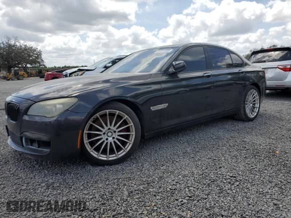 2012 BMW 7 Series 750i xDrive with VIN WBAKC6C5XCC397243, listed as a Copart auction lot 51331165 with 77,424 mi miles and Clean title. Bid and sale history available at DreamBid. Image 1.