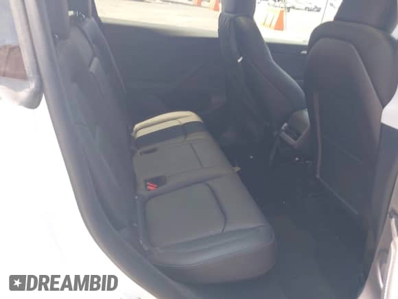 2023 Tesla Model Y Long Range с VIN 7SAYGDEE8PA034371, выставлен на аукционе IAAI как лот 42765729 с пробегом Не указан миль и . История ставок и продаж доступна на DreamBid. Изображение 8.