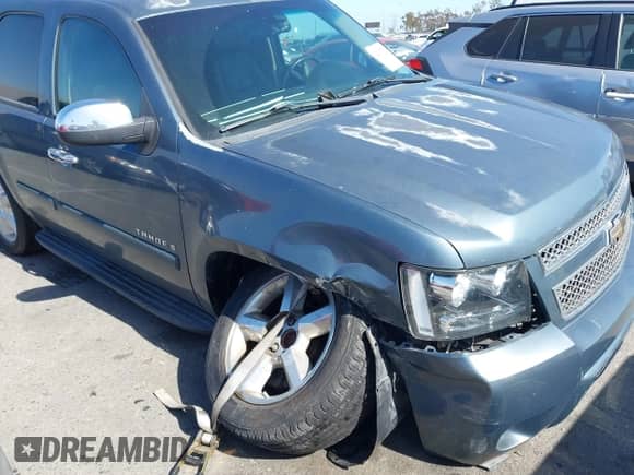 2008 Chevrolet Tahoe LTZ with VIN 1GNFC13JX8J216303, listed as a IAAI auction lot 42287728 with 152,012 mi miles and . Bid and sale history available at DreamBid. Image 6.