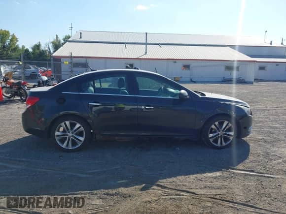 2012 Chevrolet Cruze LTZ with VIN 1G1PH5SCXC7236994, listed as a IAAI auction lot 43267252 with 232,951 mi miles and . Bid and sale history available at DreamBid. Image 14.