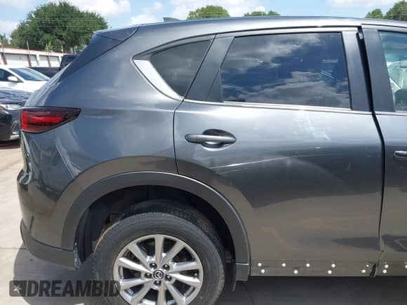 2023 Mazda CX-5 S Preferred z VIN JM3KFBCMXP0124912, wystawiony jako IAAI lot #42492270 z przebiegiem 44 510 mil mil oraz . Historia ofert i sprzedaży dostępna na DreamBid. Obrazek 17.