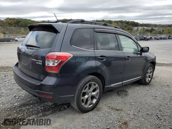 2015 Subaru Forester Touring with VIN JF2SJAUCXFH442232, listed as a Copart auction lot 86451045 with 117,359 mi miles and Salvage title. Bid and sale history available at DreamBid. Image 3.