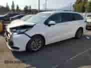 2023 Toyota Sienna LE with VIN 5TDBRKECXPS149259, listed as a Copart auction lot 80129325 with 148,265 mi miles and Salvage title. Bid and sale history available at DreamBid. Image 1.