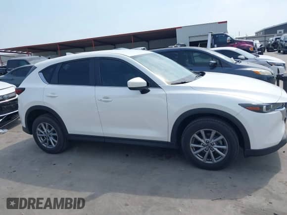 2022 Mazda CX-5 S Select с VIN JM3KFBBM9N0630312, выставлен на аукционе IAAI как лот 42266500 с пробегом 56 430 миль миль и . История ставок и продаж доступна на DreamBid. Изображение 13.
