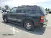 2002 Chevrolet Tahoe LS with VIN 1GNEC13T52R290024, listed as a Copart auction lot 65583635 with 154,333 mi miles and Salvage title. Bid and sale history available at DreamBid. Image 2.