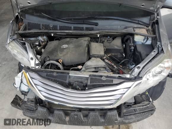 2017 Toyota Sienna XLE z VIN 5TDYZ3DC5HS853615, wystawiony jako Copart lot #68695805 z przebiegiem 77 167 mil mil oraz Szkoda całkowita • Salvage title. Historia ofert i sprzedaży dostępna na DreamBid. Obrazek 12.