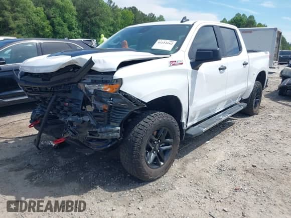 2025 Chevrolet Silverado 1500 Custom Trail Boss with VIN 3GCUKCED6SG194217, listed as a IAAI auction lot 42214162 with 13,407 mi miles and . Bid and sale history available at DreamBid. Image 18.