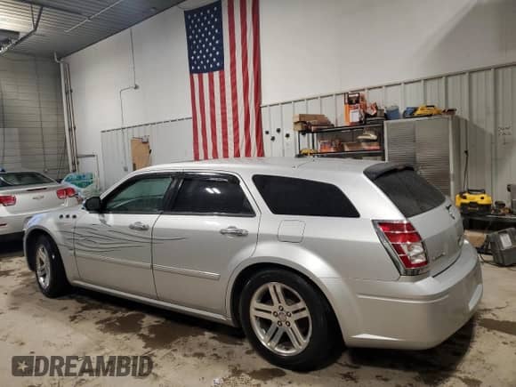 2005 Dodge Magnum RT с VIN 2D4GV58235H591613, выставлен на аукционе Copart как лот 86317214 с пробегом Не указан миль и Списание • Salvage title. История ставок и продаж доступна на DreamBid. Изображение 2.
